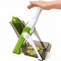Vegetable cutter and slicer for potatoes carrots and other vegetables